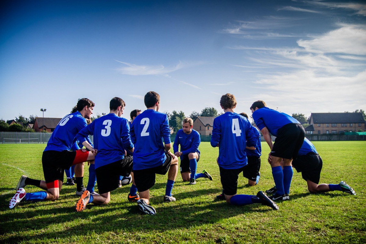 Football players competing in a professional match